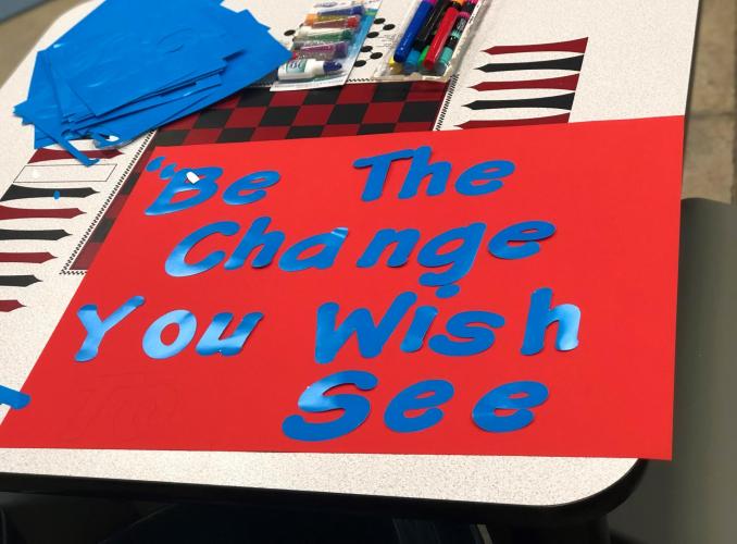 Artwork by youth stating "be the change you wish to see" 