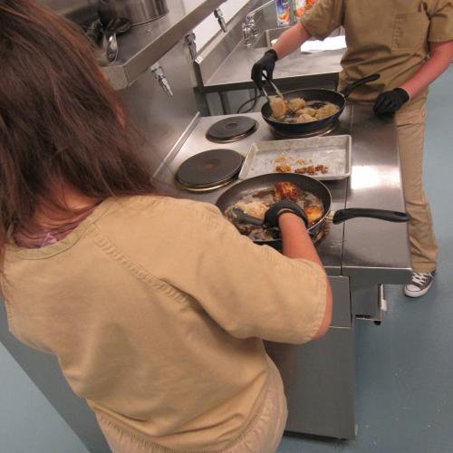 youth cooking during culinary class